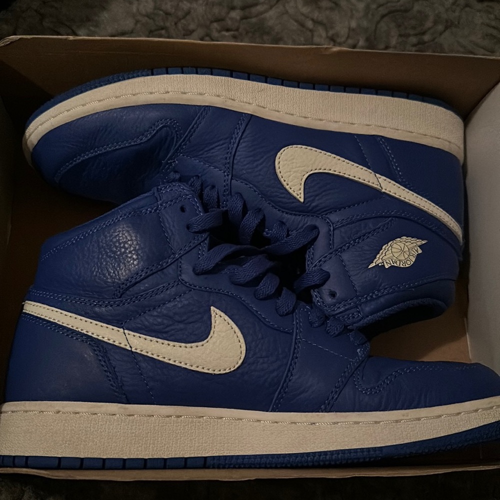 Blue and white Jordan 1s